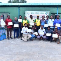 Participant with their certificates
